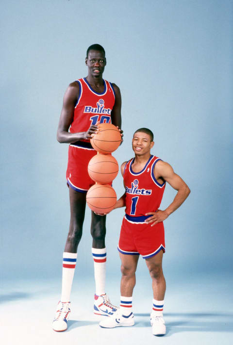 Manute Bol and Muggsy Bogues in 1987.