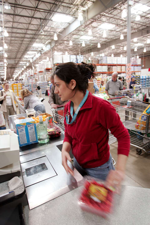 Costco cashiers keep the lines moving. 