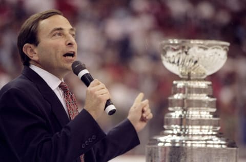 NHL commissioner Gary Bettman and the Cup.