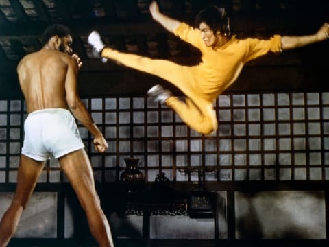 Lee faces off against Kareem Abdul-Jabbar.