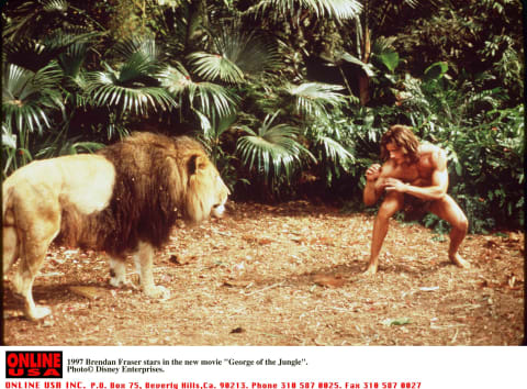 Brendan Fraser faces off against a lion in 'George of the Jungle' (1997).