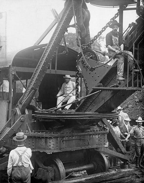 Theodore Roosevelt in a construction vehicle at the Panama Canal.