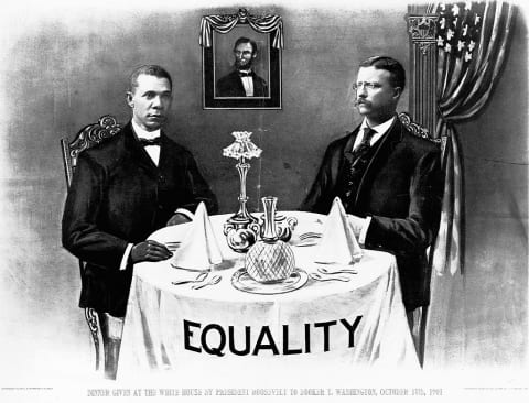 A political cartoon showing Booker T. Washington dining with President Theodore Roosevelt