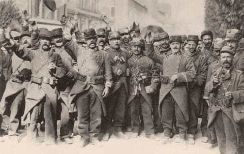 French soldiers sing the national anthem during World War I.