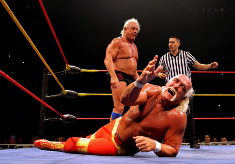 Ric Flair, seen here squaring off against Hulk Hogan, was known for fighting dirty in the ring.