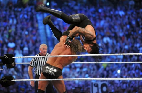 This move, delivered here by Triple H, looks like one serious bump for the Undertaker. 