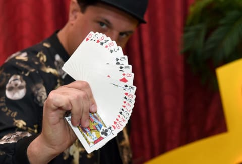 Magician Douglas Leferovich teaches card tricks