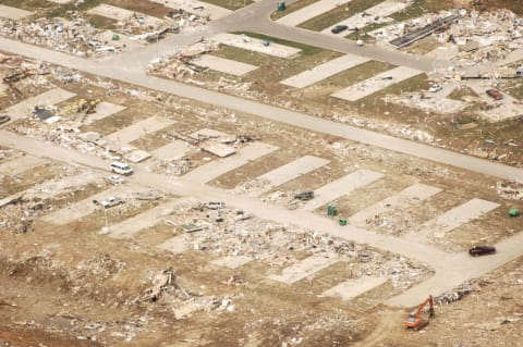 A deadly tornado in Indiana swept mobile homes off their foundations .