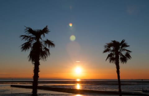 The sun sets off Southend on Sea, UK.