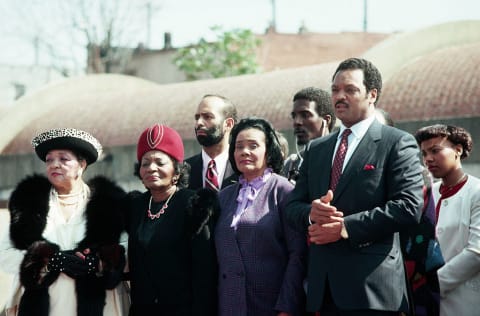 Jesse Jackson (right), at MLK Jr.’s grave with (from left to right) his mother, Dr. King's mother Alberta King, and King's widow Coretta Scott King. 