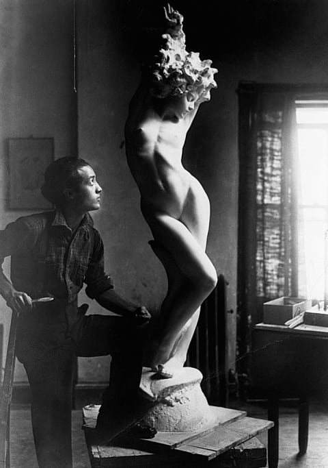 Isamu Noguchi at work.