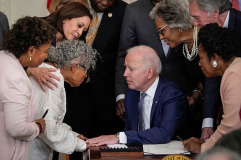 Lee and company convene to watch Biden sign the Juneteenth National Independence Day Act into law.