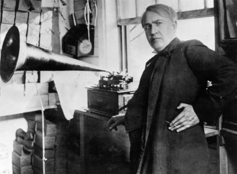 Thomas Edison with a standard phonograph.