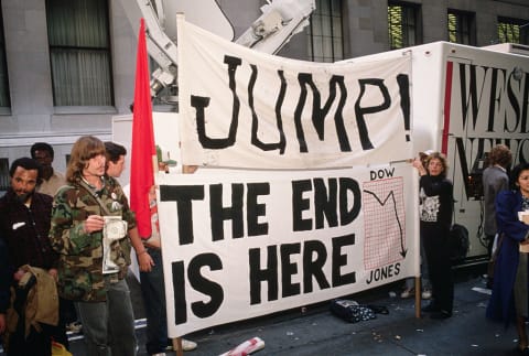 People in New York's Financial District react to the October 13 stock market crash.