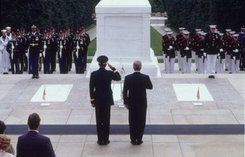 President Bill Clinton laying a wreath at the Tomb of the Unknown Soldier, 1993. 