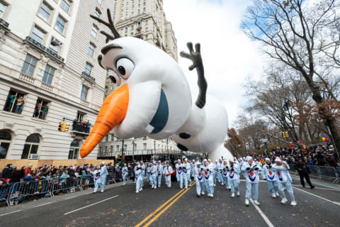 Olaf and his handlers at the 93rd Annual Macy's Thanksgiving Day Parade.