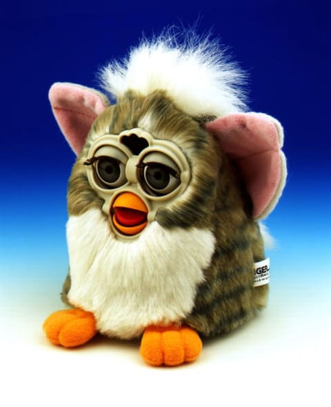 A Furby starts out by speaking only Furbish, and then begins integrating English into its vocabulary. 