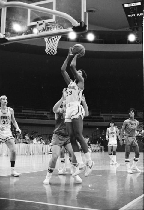 Barack Obama playing basketball in high school.