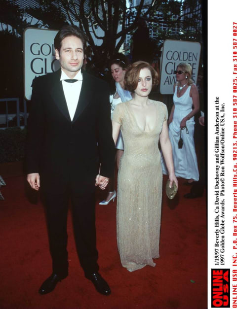 David Duchovny And Gillian Anderson attend the Golden Globe Awards.