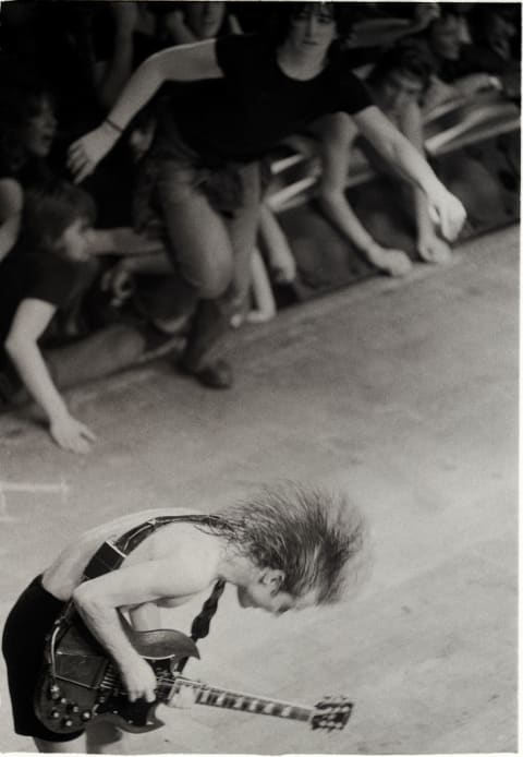 Angus Young of AC/DC headbanging in 1980.