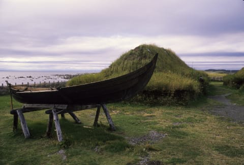 Replicas of a Viking structure and boat at L’Anse aux Meadows.