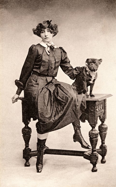 French writer Sidonie Gabrielle Colette with a French bulldog, circa 1900.