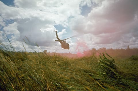 A helicopter assault during the Vietnam War.