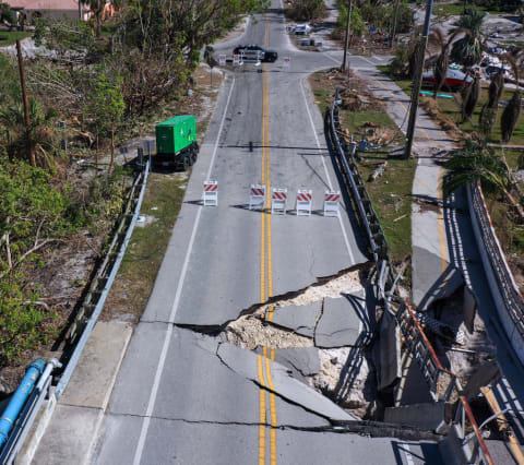 A storm surge during Hurricane Ian caused damage to coastal infrastructure.