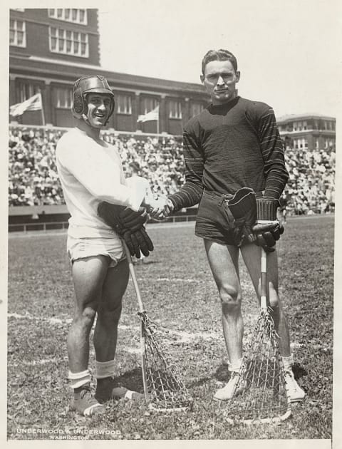 Lacrosse players at an early modern Olympics.