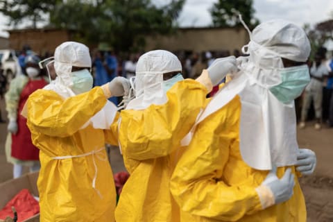 Health care workers in Uganda wear personal protective equipment during an ebola outbreak.