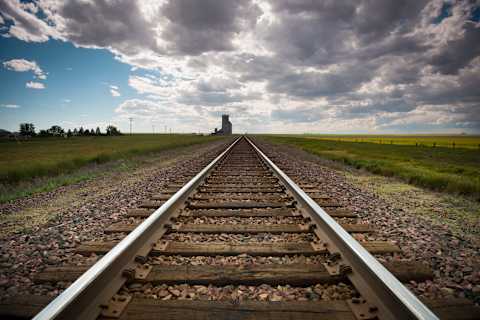 The 'ol dead-body-on-the-tracks gambit. Never fails.