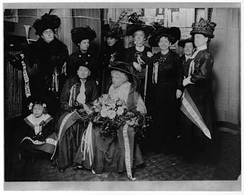 Victoria Claflin Woodhull and Tennessee Claflin with their fellow suffragists.