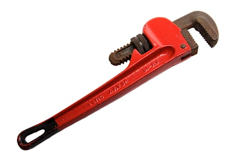 A pipe wrench is similar to a monkey wrench, but with serrated jaws.