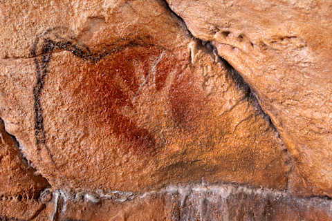 A replica of one of the many stenciled handprints of the cave’s artists.