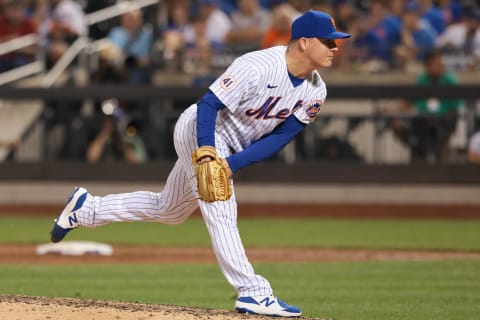 Aug 26, 2021; New York City, New York, USA;New York Mets relief pitcher Aaron Loup (32) delivers a