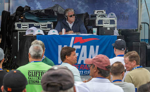 People attend the WFAN's Mike Francesa Summer Send-Off show at Bar Anticipation in Lake Como, NJ on