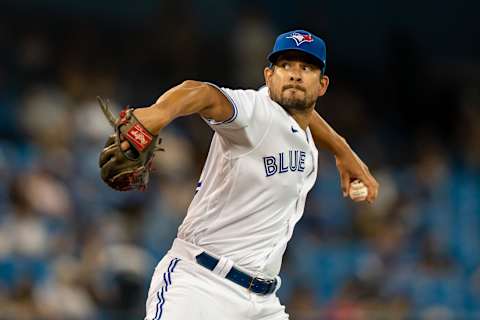 Aug 7, 2021; Toronto, Ontario, CAN; Toronto Blue Jays relief pitcher Brad Hand (52) delivers a pitch