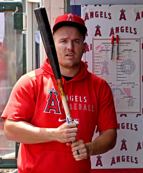 Aug 15, 2021; Anaheim, California, USA;   Los Angeles Angels mike Trout (27) in the dugout before