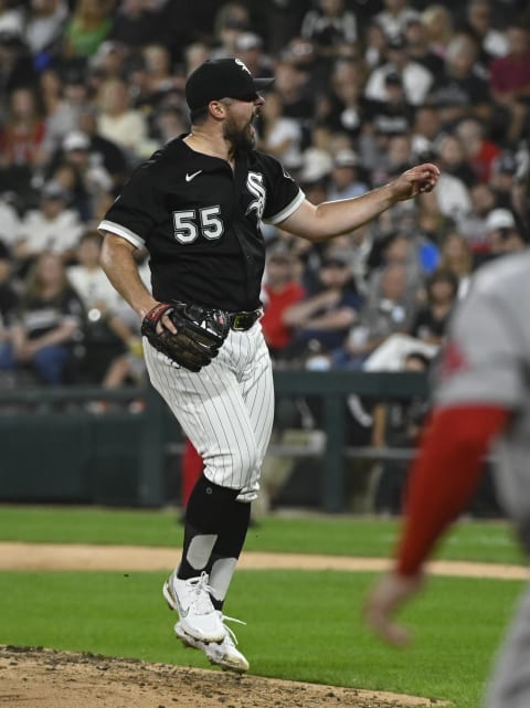 Sep 10, 2021; Chicago, Illinois, USA;  Chicago White Sox starting pitcher Carlos Rodon (55) yells