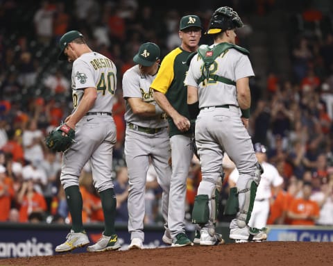 Jul 6, 2021; Houston, Texas, USA; Oakland Athletics starting pitcher Chris Bassitt (40) walks off