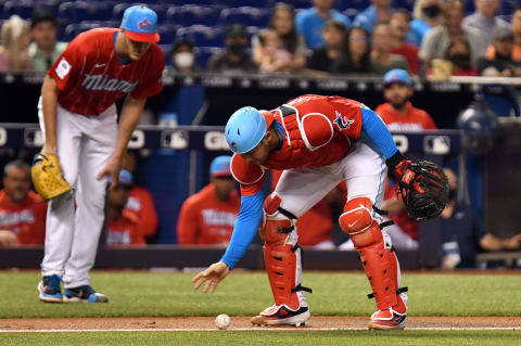 Sep 4, 2021; Miami, Florida, USA; Miami Marlins catcher Alex Jackson (23) watches a softly hit ball