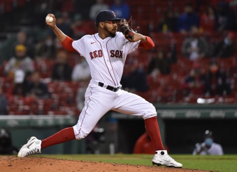 May 12, 2021; Boston, Massachusetts, USA;  Boston Red Sox relief pitcher Eduard Bazardo (83) pitches against the Oakland Athletics