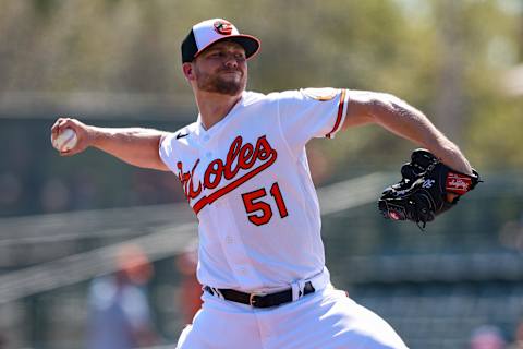 Mar 1, 2023; Sarasota, Florida, USA;  Baltimore Orioles starting pitcher Austin Voth (51) throws a pitch in spring training against the Blue Jays