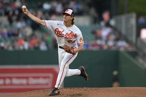 Apr 24, 2023; Baltimore, Maryland, USA; Baltimore Orioles starting pitcher Dean Kremer (64) throws a pitch against the Boston Red Sox in April of 2023