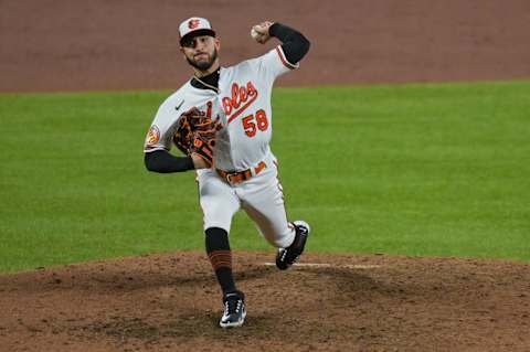 Apr 25, 2023; Baltimore, Maryland, USA; Baltimore Orioles relief pitcher Cionel Perez (58) pitches against the Boston Red Sox in April of 2023 at home