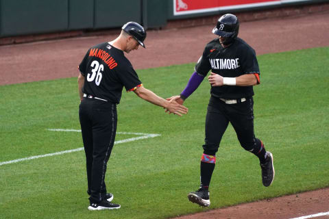 May 27, 2023; Baltimore, Maryland, USA; Baltimore Orioles outfielder Austin Hays (21) celebrates after hitting a home run against the Texas Rangers