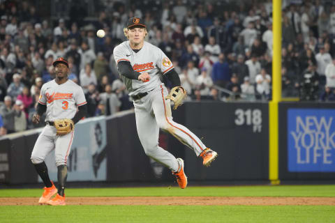 May 23, 2023; Bronx, New York, USA; Baltimore Orioles third baseman Gunnar Henderson throws out a runner at first base against the New York Yankees