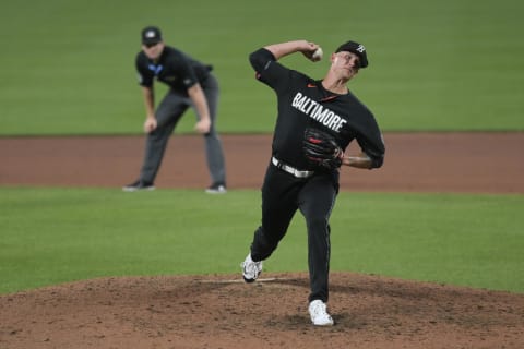 Jun 9, 2023; Baltimore, Maryland, USA;  Baltimore Orioles starting pitcher Tyler Wells (68) throws a pitch against the Kansas City Royals