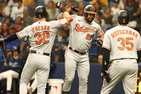 Jun 20, 2023; St. Petersburg, Florida, USA; Baltimore Orioles right fielder Anthony Santander (25) celebrates with Ryan O'Hearn and Adley Rutschman