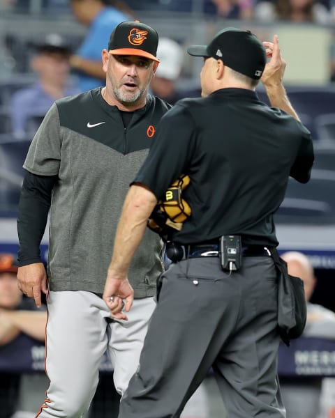 Jul 6, 2023; Bronx, New York, USA; Home plate umpire Dan Iassogna (58) ejects Baltimore Orioles